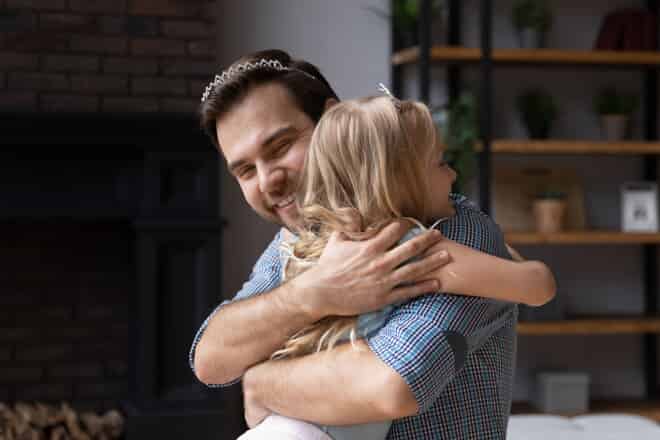 father and daughter hugging